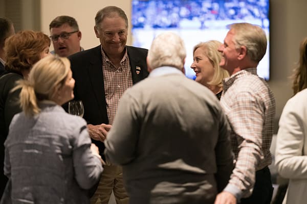 Executive Conference guests at a networking reception