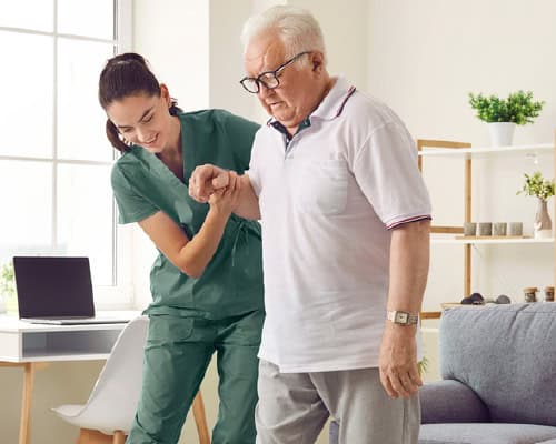 Staff and resident at skilled nursing facility