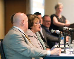 HIDA's Gina Smith moderates a panel of GPO executives.